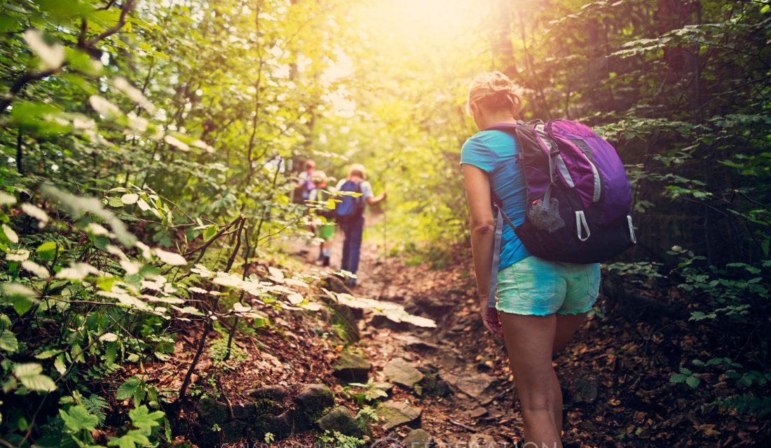 Girl hiking in woods