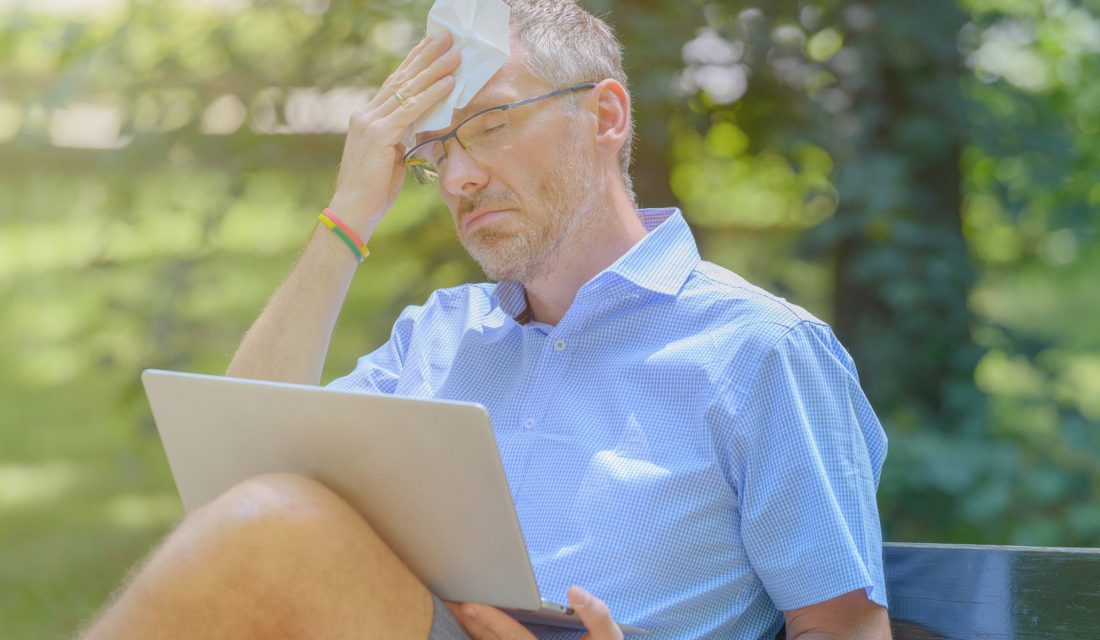 man sweating in sun