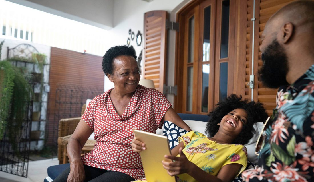 family outside deck tablet